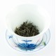 Flowery Jin Jun Mei prêt à être infusé avec un gaiwan en porcelaine